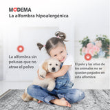 Alfombra 'Grace' con un bebé y una mascota jugando sobre ella. Destaca por su diseño elegante y suave, ideal para familias. La alfombra es lavable en lavadora, antideslizante, sin pelusas e hipoalergénica, ofreciendo comodidad y seguridad para todos los miembros de la familia.