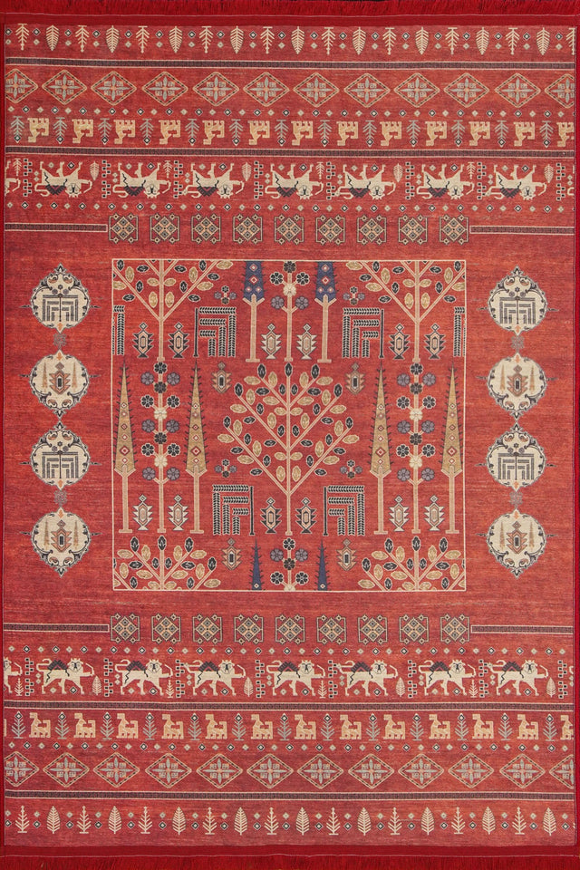 Alfombra 'Jardín Oriental' sobre un fondo blanco, destacando su intenso color rojo y el elaborado diseño central. Los patrones geométricos y florales en colores crema y azul añaden profundidad y un toque artístico, perfecta para cualquier entorno que busque lujo y calidez.