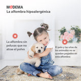 Bebé y mascota jugando sobre la alfombra 'Serenity', con texto que destaca sus características: lavable en lavadora, base antideslizante, y su diseño lujoso, proporcionando comodidad y estilo.