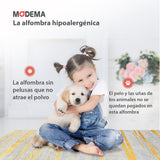 Bebé y mascota jugando sobre la alfombra 'Luxora', con texto que destaca sus características: lavable en lavadora, base antideslizante, sin pelusas e hipoalergénica, ofreciendo comodidad y facilidad de mantenimiento.