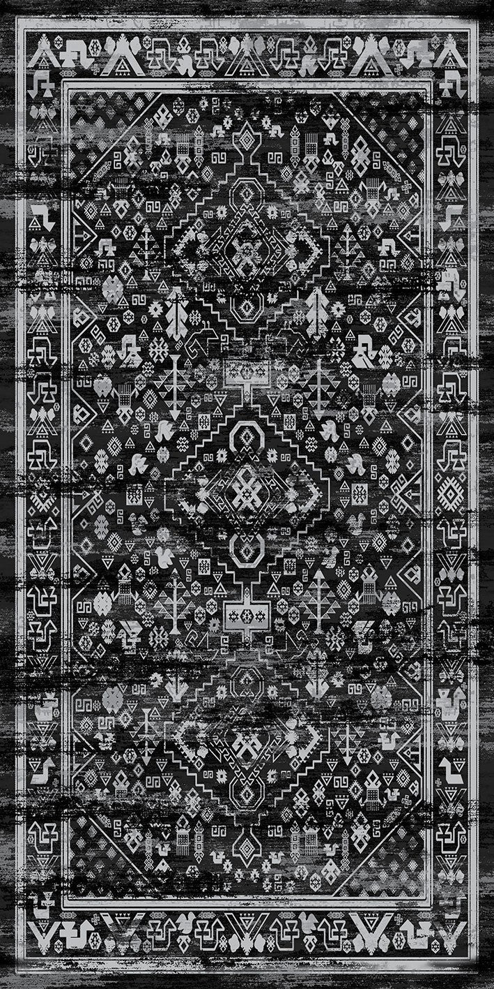 Alfombra 'Lustre' sobre un fondo blanco, resaltando su diseño simétrico con un medallón central y motivos geométricos en blanco, negro y gris, que aporta un toque de encanto vintage a cualquier espacio.