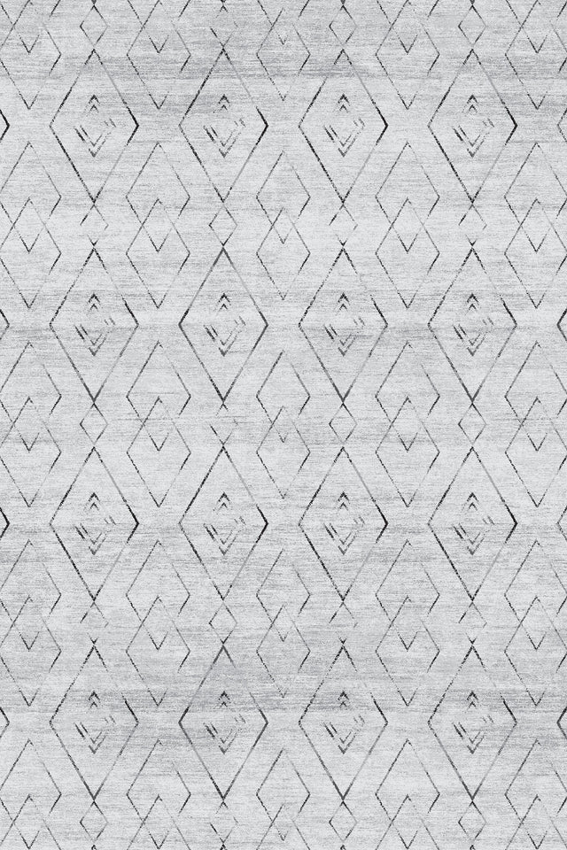 Alfombra 'Rhythm' sobre un fondo blanco, destacando su diseño geométrico con diamantes entrelazados. Los colores neutros la hacen versátil para cualquier decoración, y es lavable en lavadora para un mantenimiento práctico.