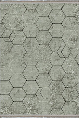 Alfombra 'Terra' sobre un fondo blanco, destacando su diseño hexagonal en tonos grises, ideal para añadir un toque de elegancia moderna y contemporánea a cualquier decoración.